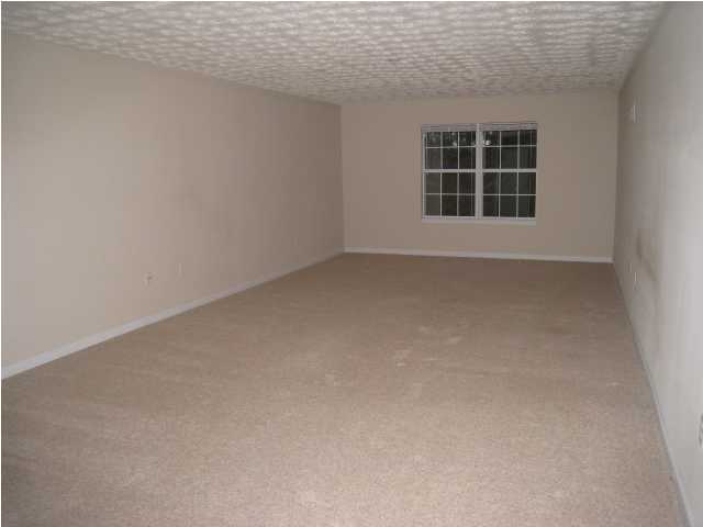 243 Bay Grove Road Freeport, FL 32439 - Photo 11 of 14 an empty room with windows