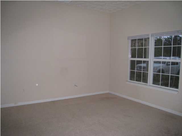 243 Bay Grove Road Freeport, FL 32439 - Photo 6 of 14 an empty room with a window
