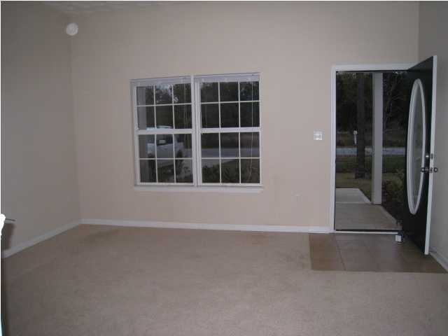 243 Bay Grove Road Freeport, FL 32439 - Photo 7 of 14 a view of an empty room with a window