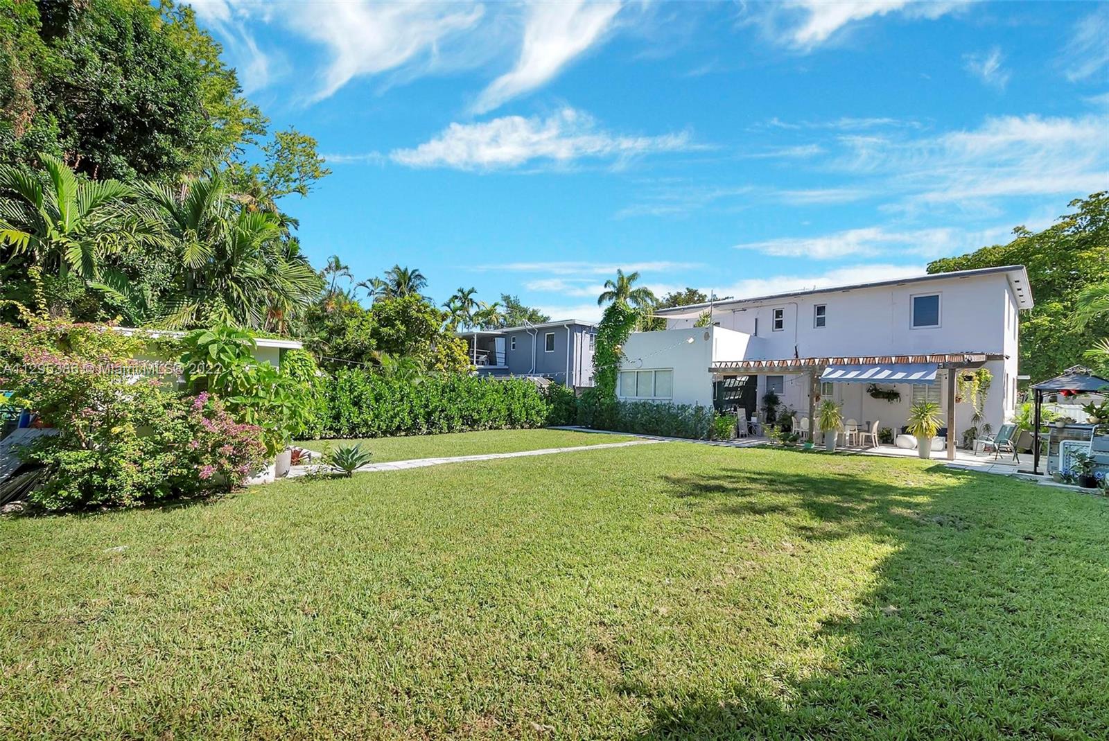1242 Southwest 13th Avenue Miami, FL 33135 - Photo 16 of 42 a big yard with large trees