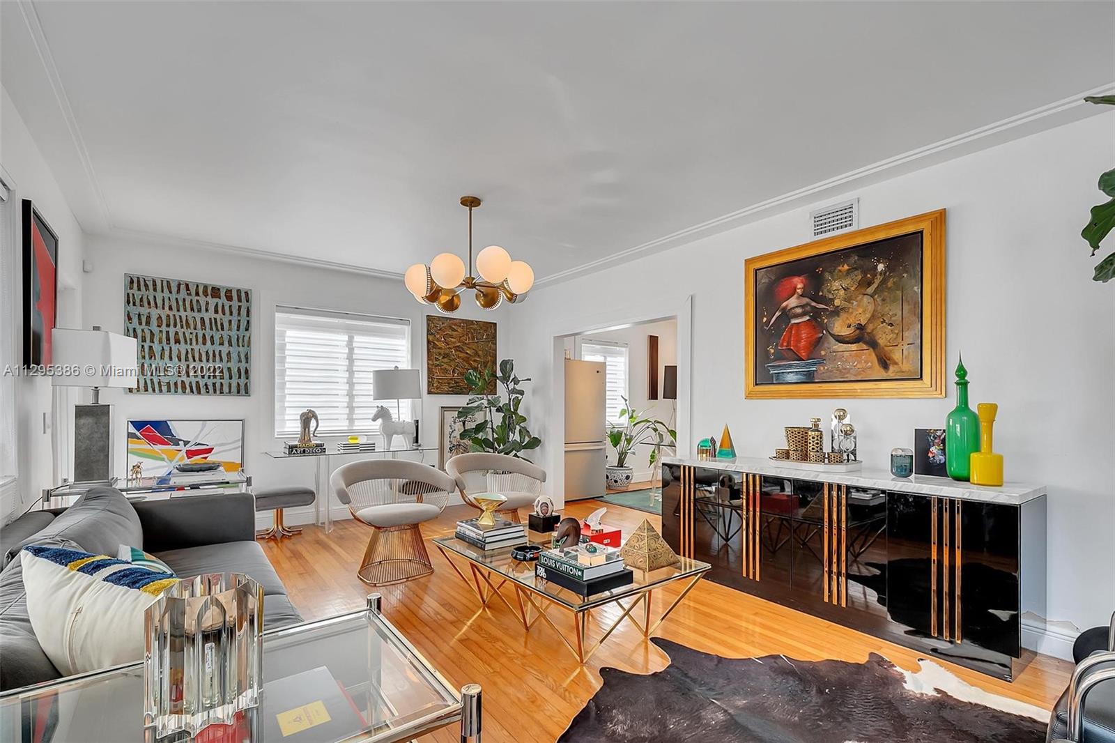 1242 Southwest 13th Avenue Miami, FL 33135 - Photo 22 of 42 a living room with furniture and a large window