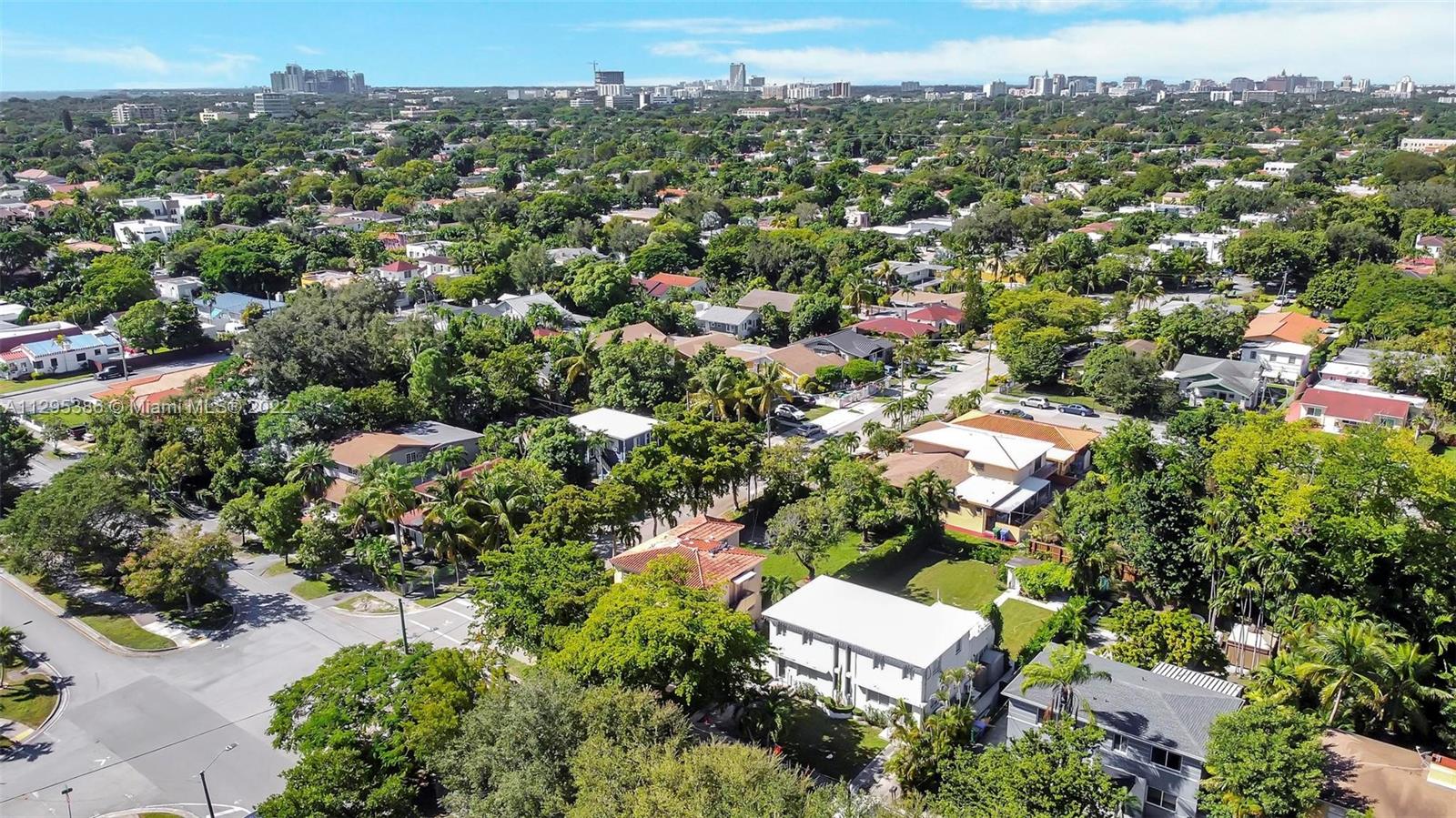 1242 Southwest 13th Avenue Miami, FL 33135 - Photo 31 of 42 an aerial view of a city with lots of residential buildings