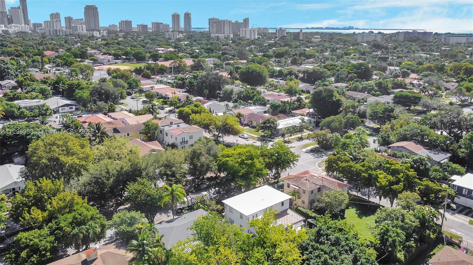 1242 Southwest 13th Avenue Miami, FL 33135 - Photo 32 of 42 an aerial view of residential houses with city view