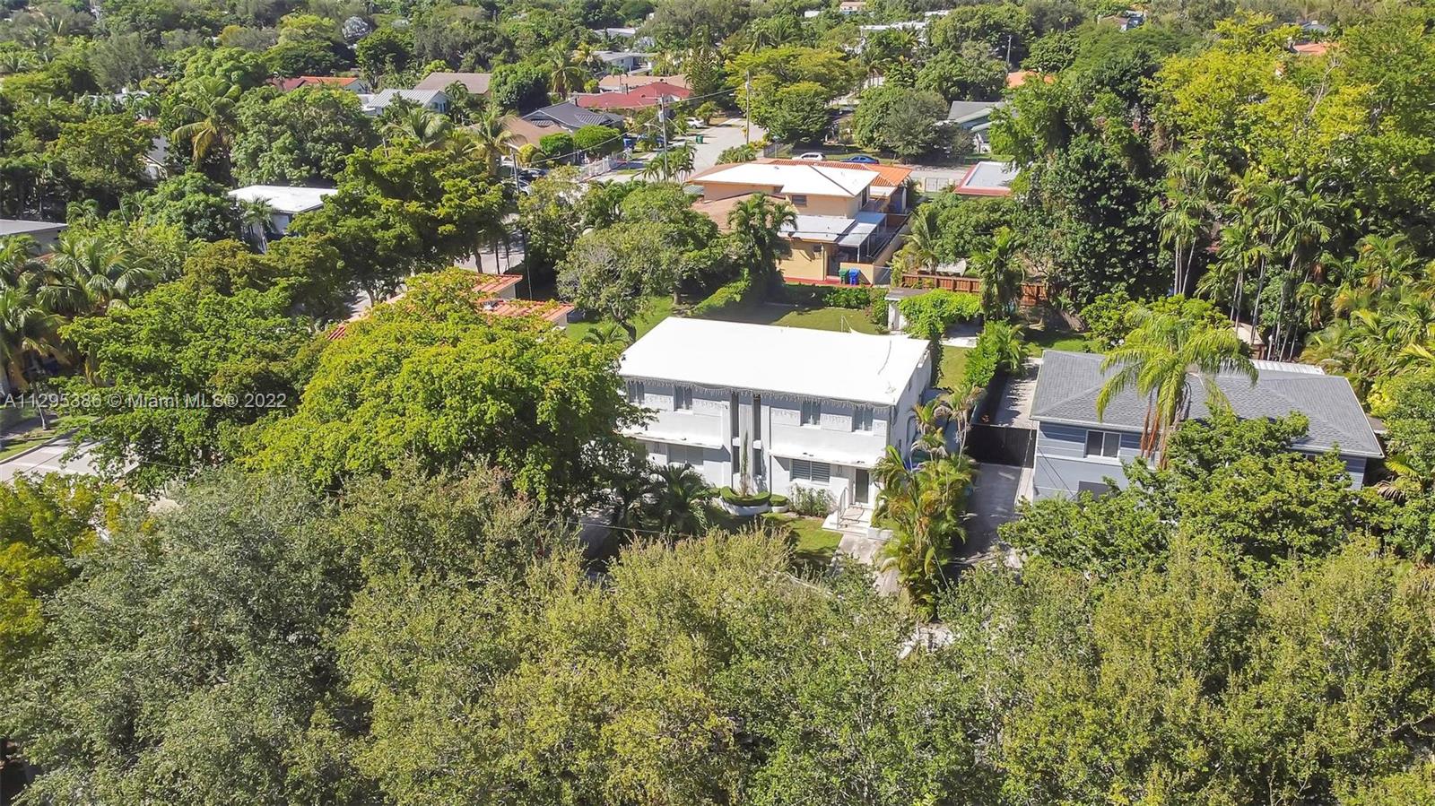 1242 Southwest 13th Avenue Miami, FL 33135 - Photo 42 of 42 an aerial view of a house with a yard