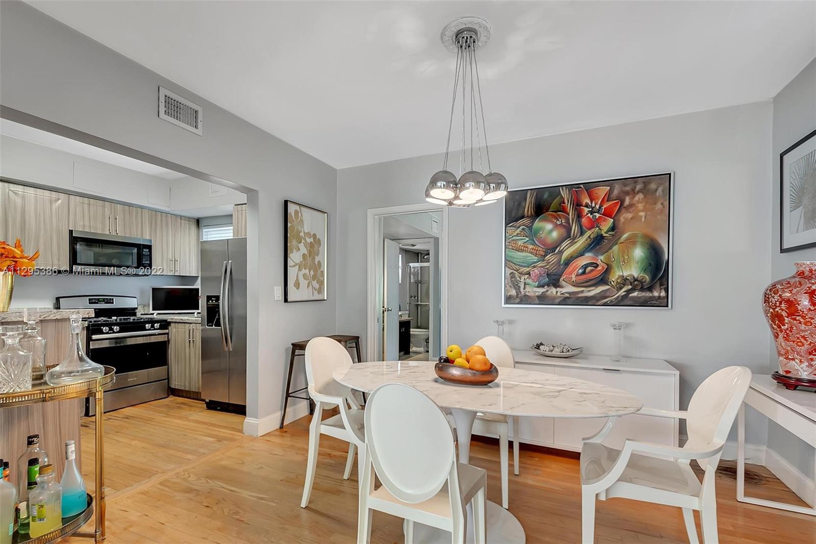 1242 Southwest 13th Avenue Miami, FL 33135 - Photo 6 of 42 a view of a dining room with furniture