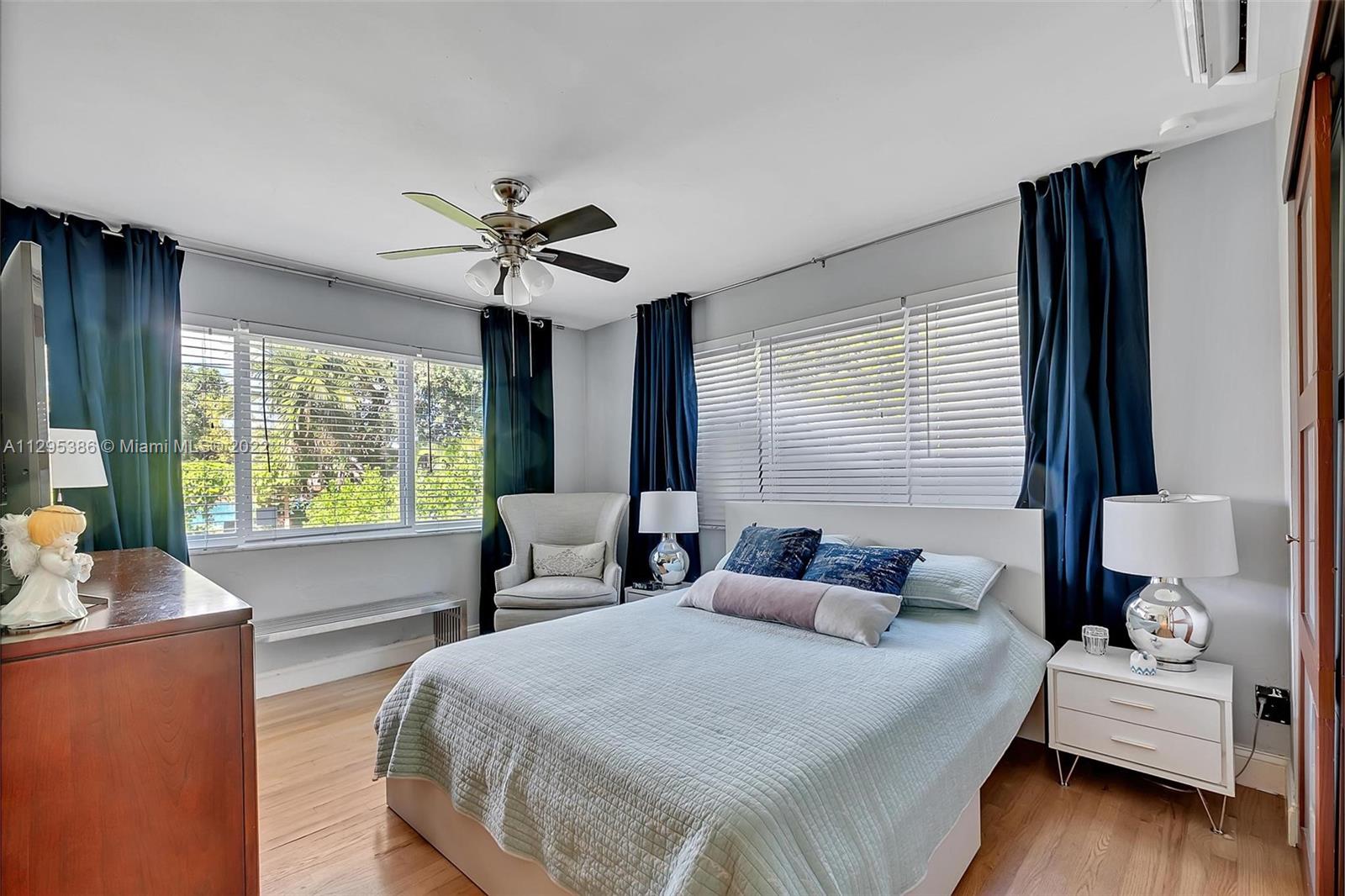 1242 Southwest 13th Avenue Miami, FL 33135 - Photo 9 of 42 a bedroom with bed and windows