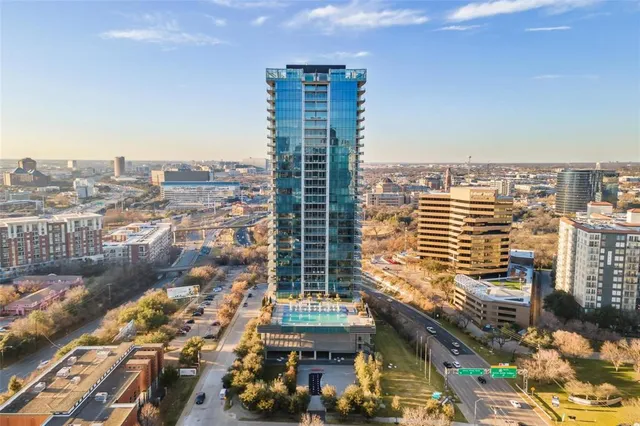 a view of a city with tall buildings
