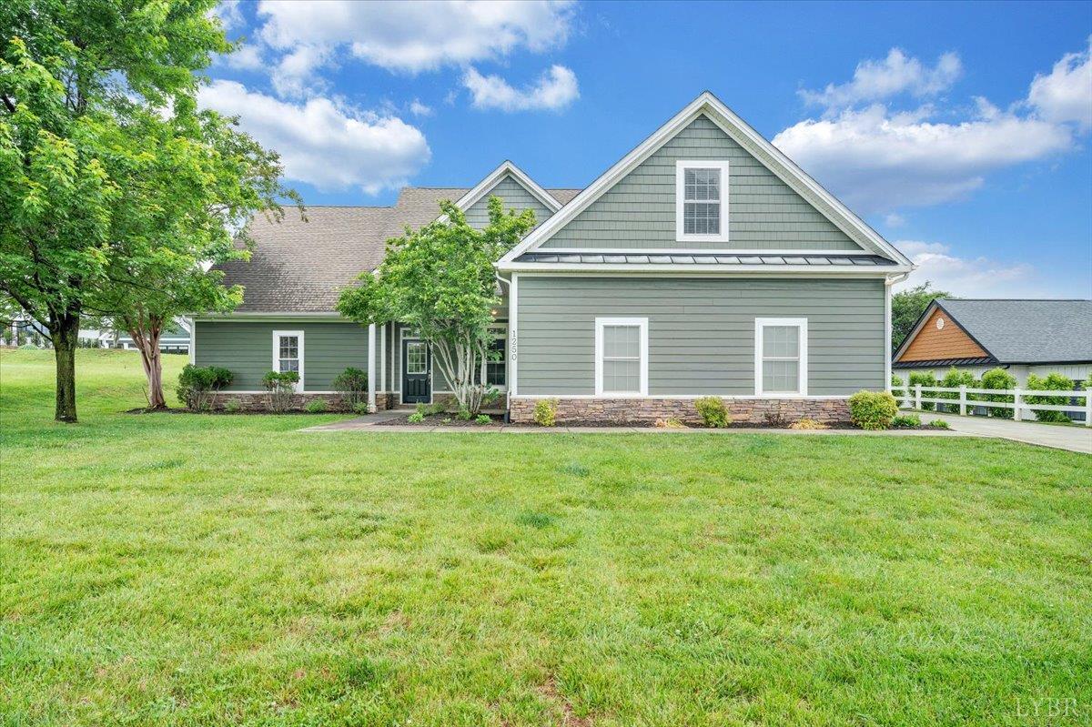 1250 Our Cove Road Huddleston, VA 24104 - Photo 53 of 70 a front of a house with a garden