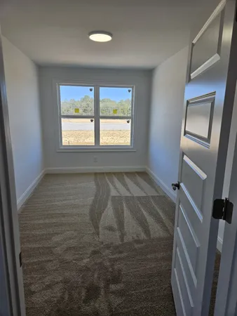 a view of a room with a window
