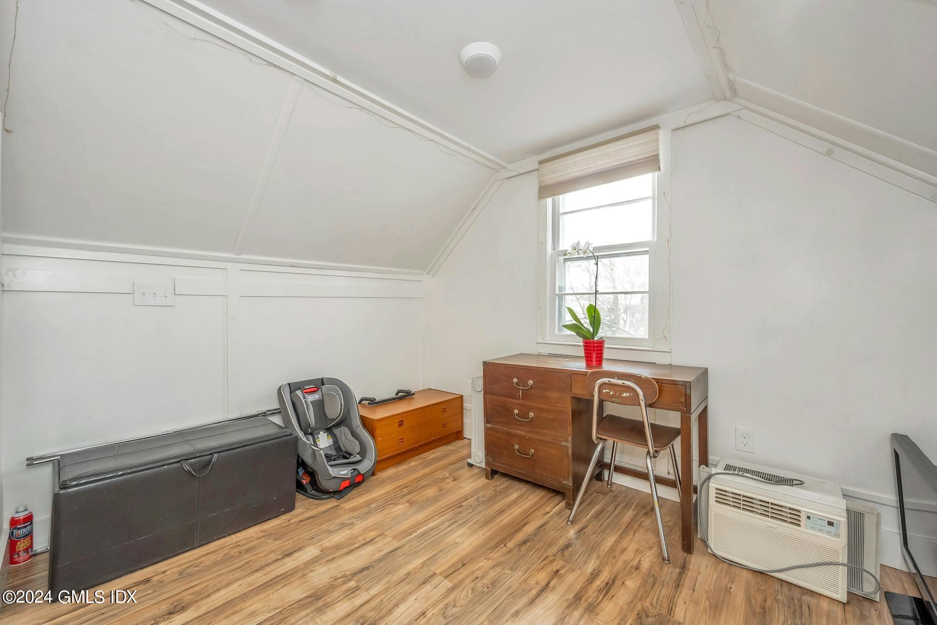 37 Leighton Road Trumbull, CT 06606 - Photo 14 of 24 a workspace with furniture and wooden floor