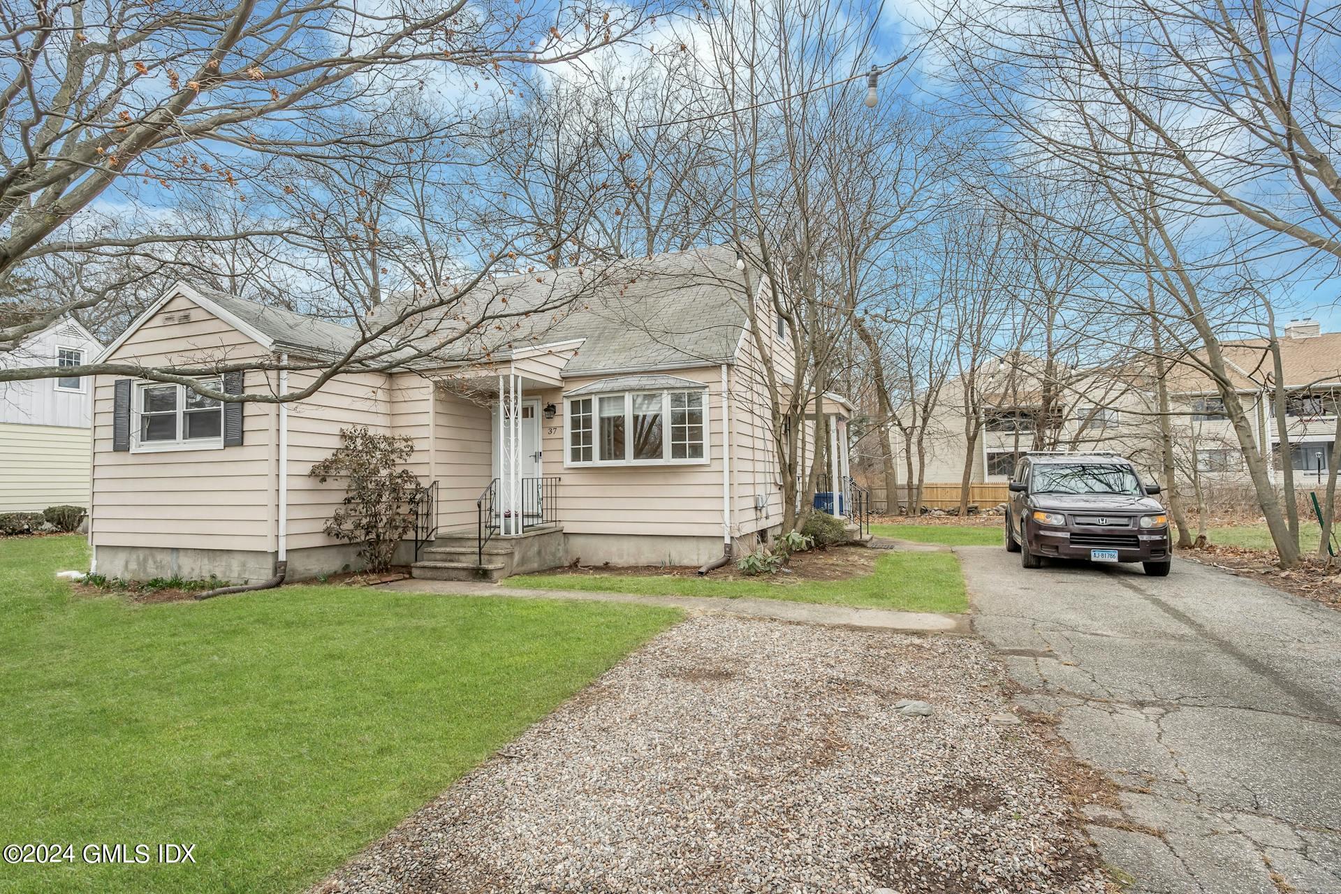 37 Leighton Road Trumbull, CT 06606 - Photo 15 of 24 a view of a house with a yard