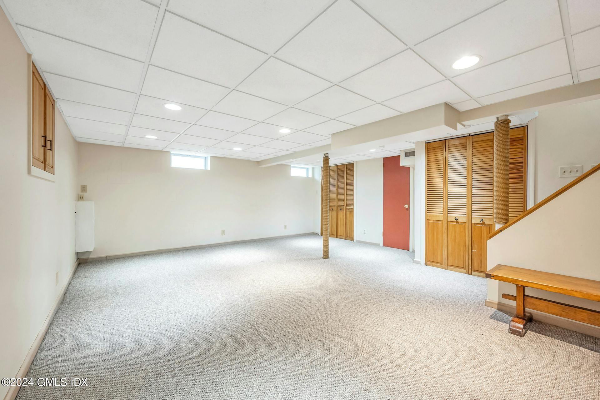 37 Leighton Road Trumbull, CT 06606 - Photo 16 of 24 a view of an empty room with windows