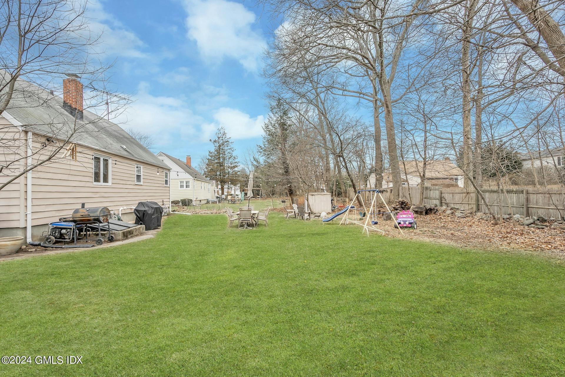 37 Leighton Road Trumbull, CT 06606 - Photo 19 of 24 a view of a house with backyard and a tree