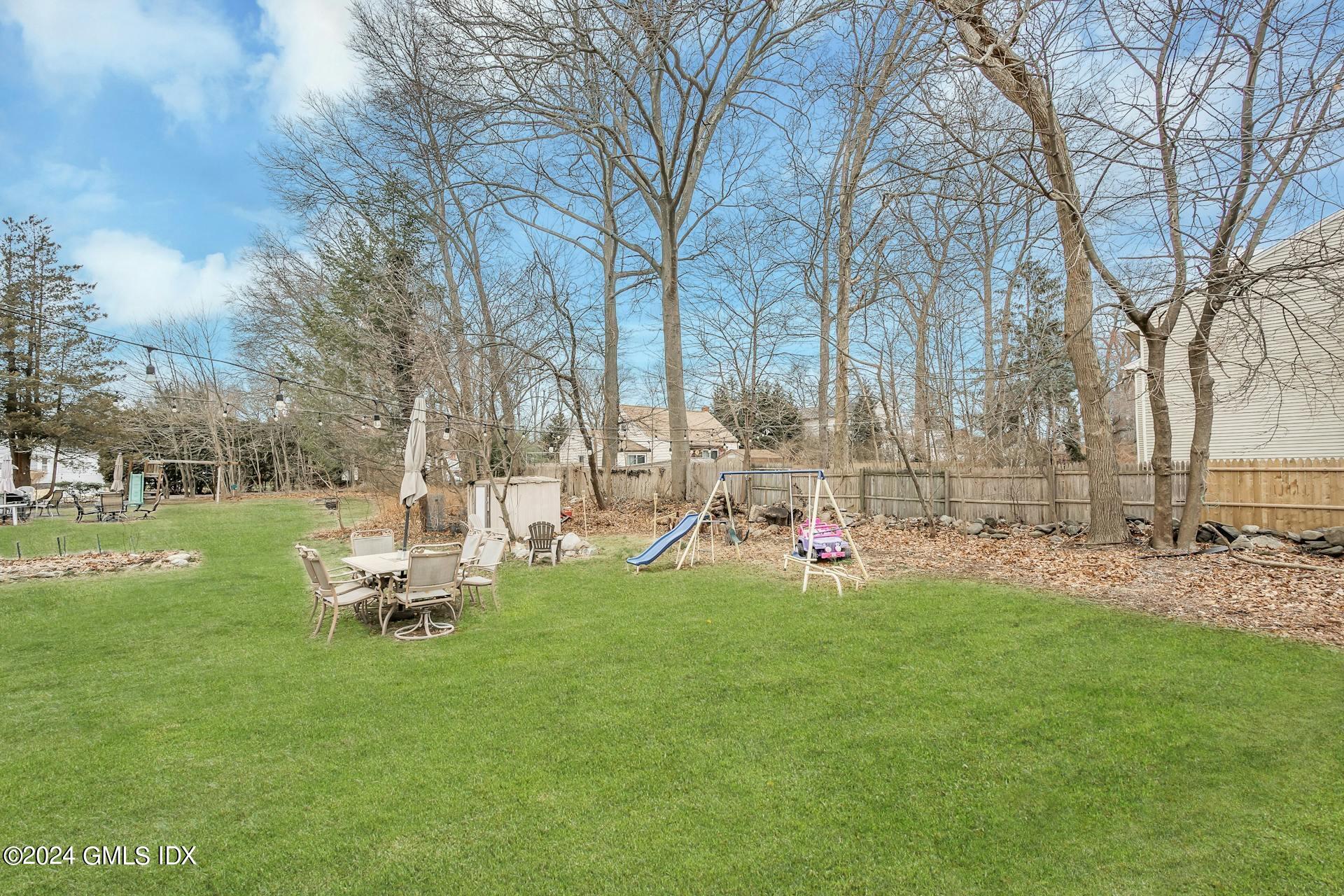 37 Leighton Road Trumbull, CT 06606 - Photo 21 of 24 a view of a park with bench and trees