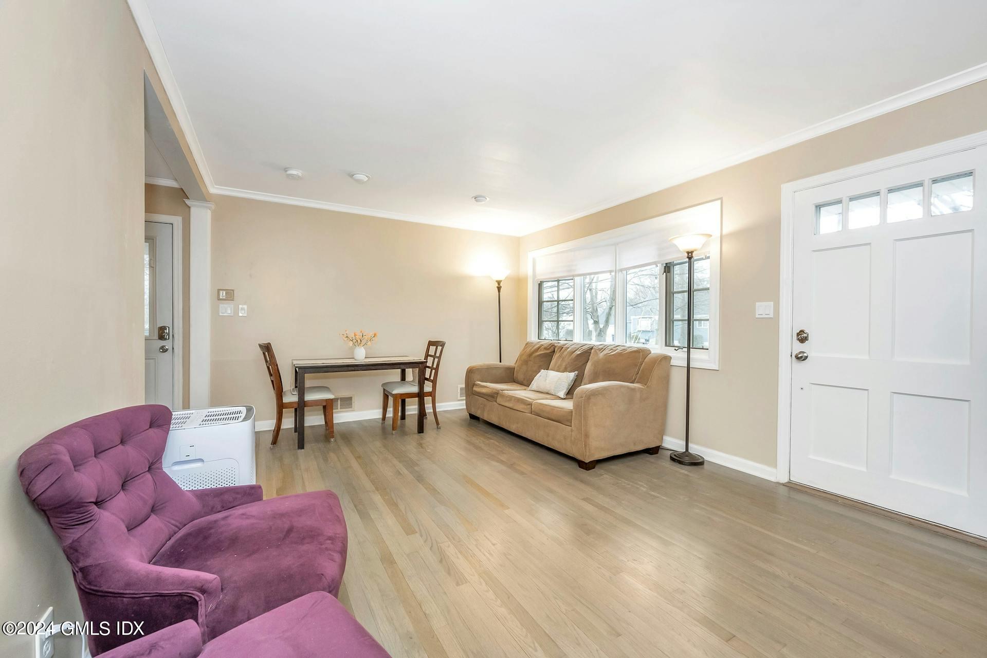 37 Leighton Road Trumbull, CT 06606 - Photo 4 of 24 a living room with furniture and a table