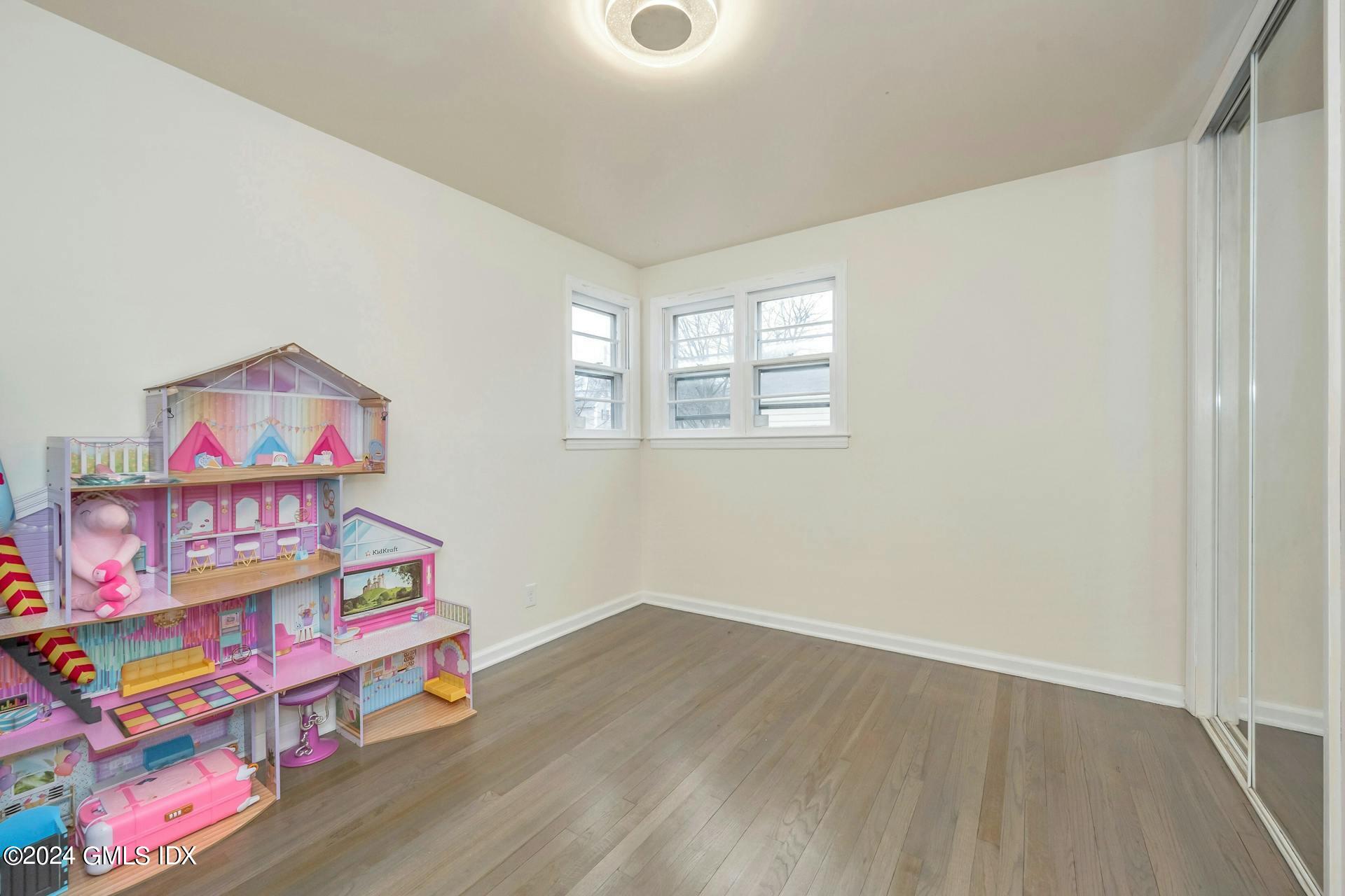 37 Leighton Road Trumbull, CT 06606 - Photo 10 of 24 an entryway with wooden floor and toys