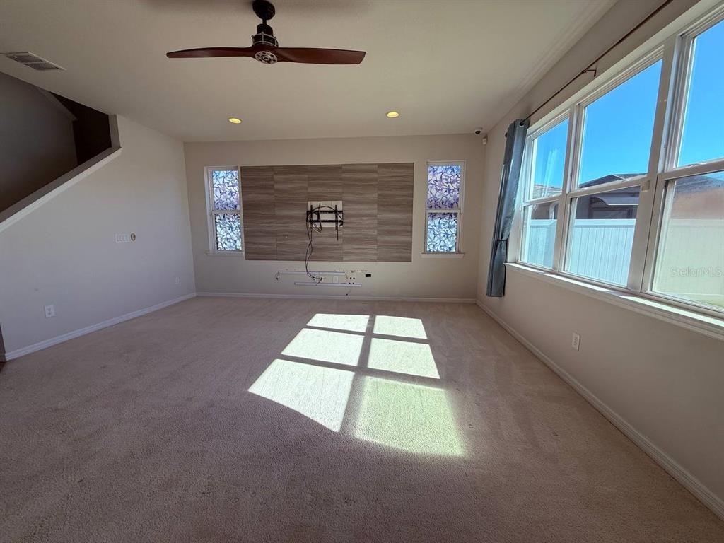 14112 Poke Ridge Drive Riverview, FL 33579 - Photo 2 of 32 a view of an empty room with a window