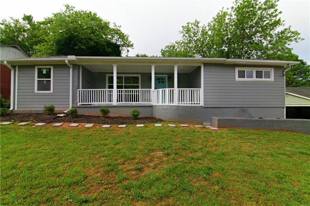 3383 Homera Place Decatur, GA 30032 - Photo 1 of 1 front view of house with a yard