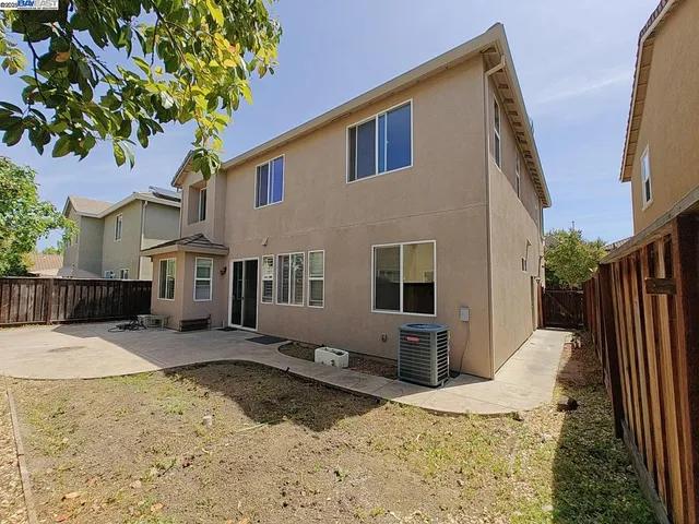a view of a house with a snow in the yard