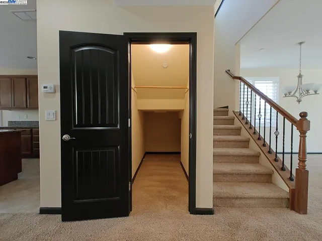 a view of a livingroom from a hallway