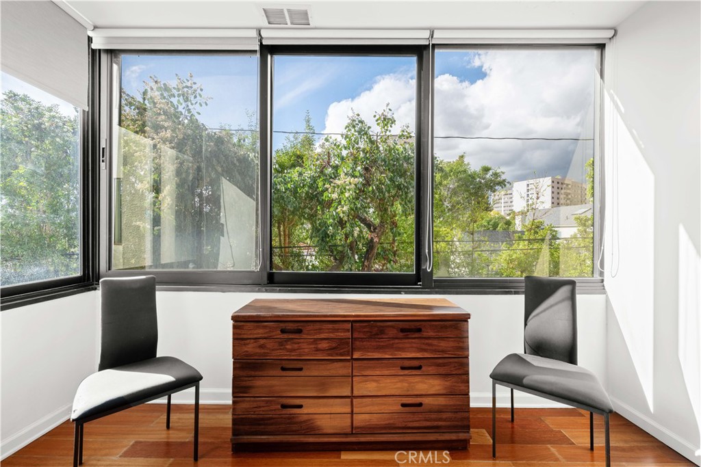 1277 South Beverly Glen Boulevard, Unit 405 Los Angeles, CA 90024 - Photo 16 of 34 Guest Bedroom Seating Area