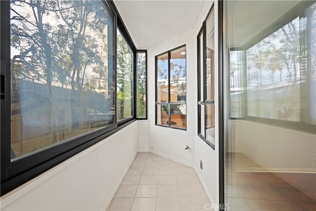 1277 South Beverly Glen Boulevard, Unit 405 Los Angeles, CA 90024 - Photo 7 of 34 Living Room Patio