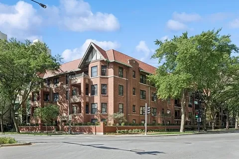 a view of a building and a street