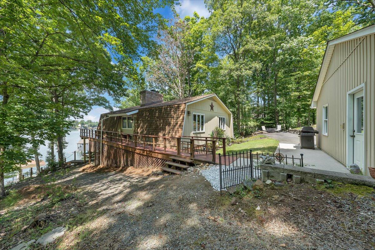 269 Highland Lake Road Union Hall, VA 24176 - Photo 29 of 45 a view of house with a yard and sitting area