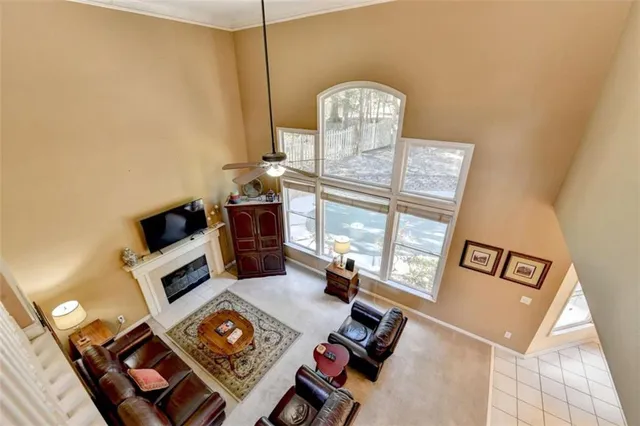 a bathroom with a sink a toilet and shower curtain