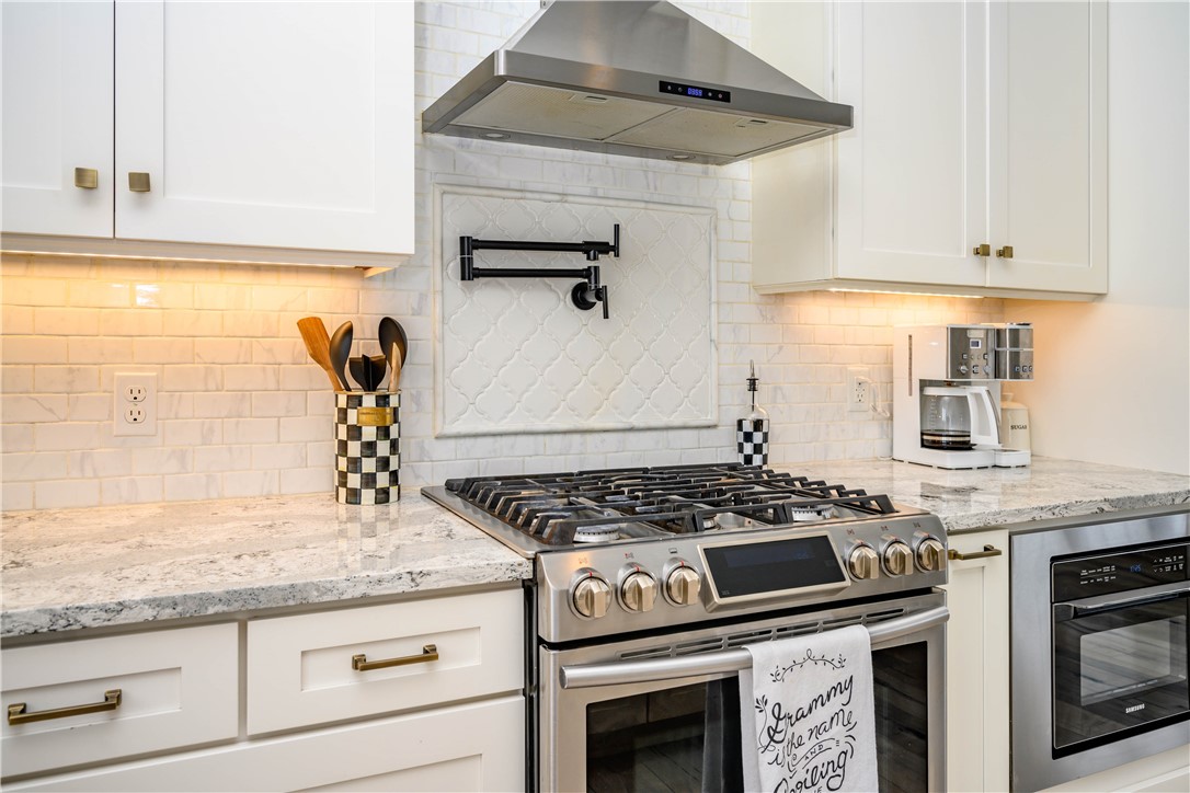 66 Kittling Ridge Lane Greece, NY 14612 - Photo 17 of 48 Beautiful backsplash with Pot filler
