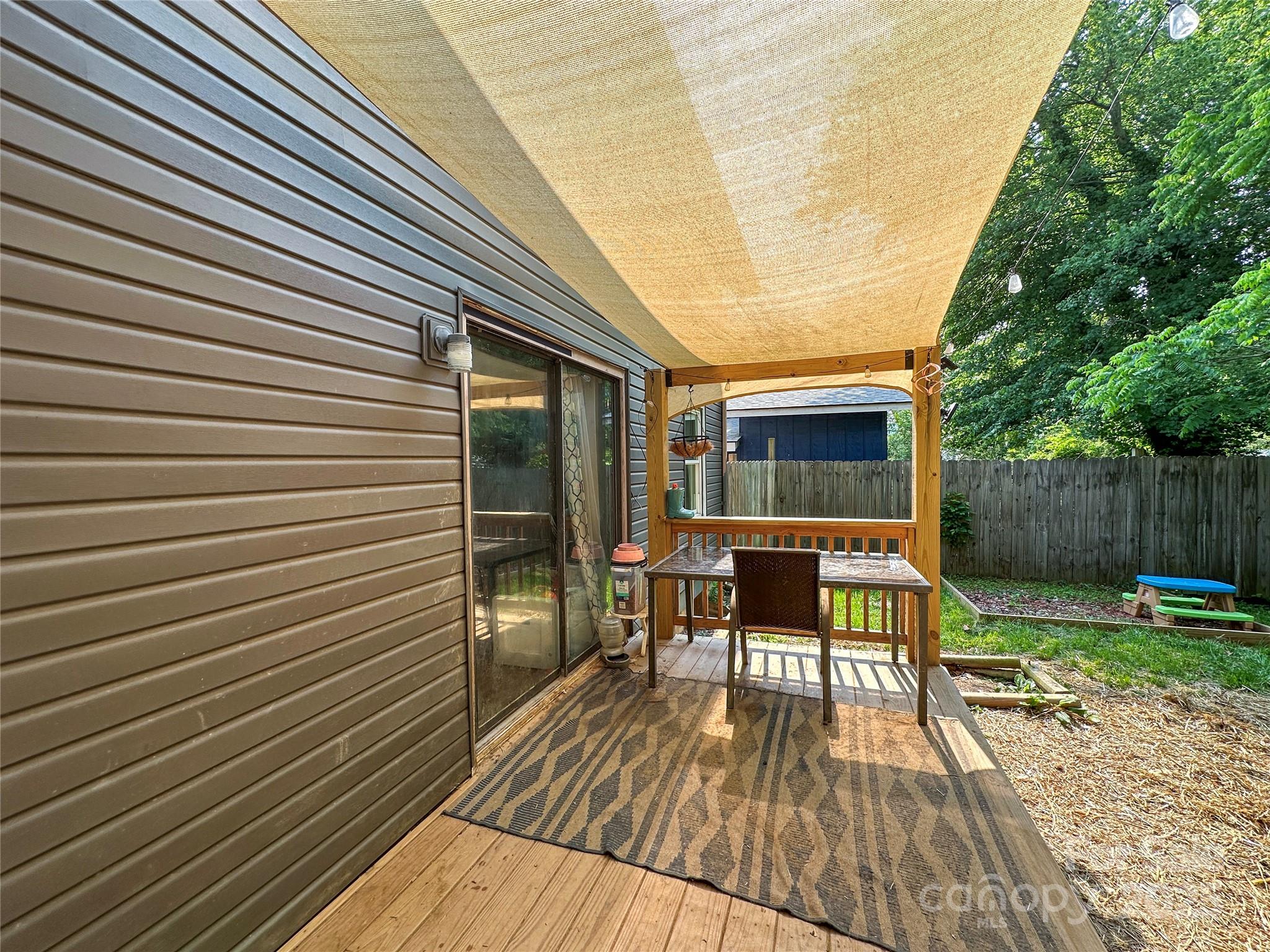 46 Westbrook Circle Clyde, NC 28721 - Photo 11 of 13 a balcony with table and chairs