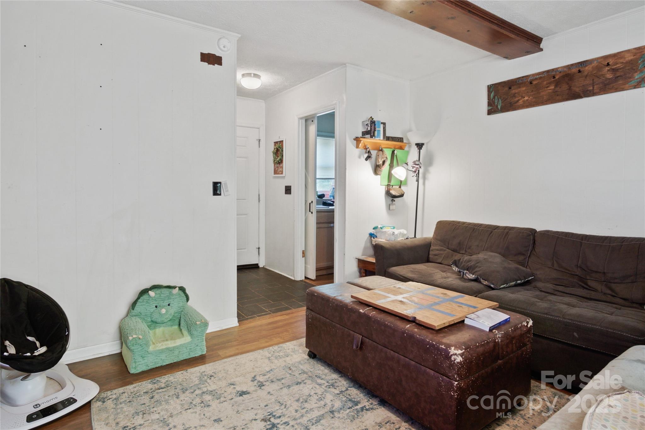46 Westbrook Circle Clyde, NC 28721 - Photo 5 of 13 a living room with furniture and wooden floor