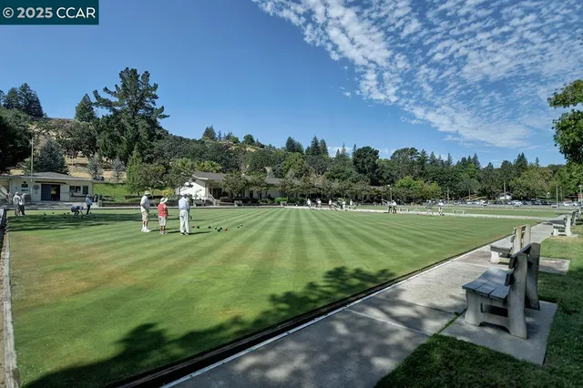 a view of a golf course with a garden