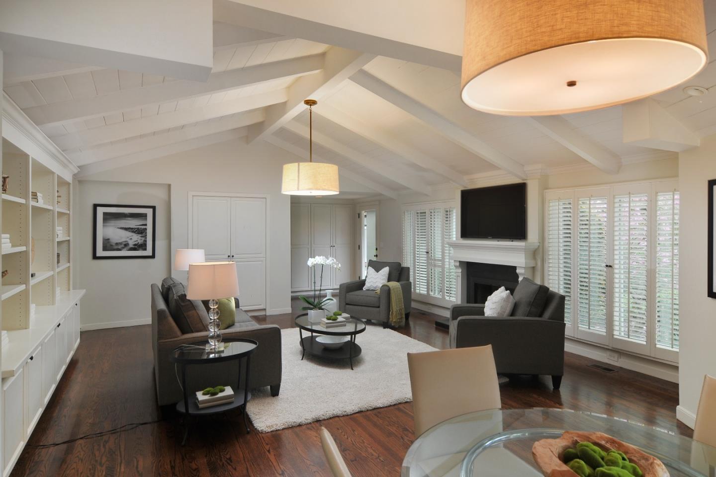 47 Ralston Road Atherton, CA 94027 - Photo 12 of 35 a living room with furniture and a flat screen tv