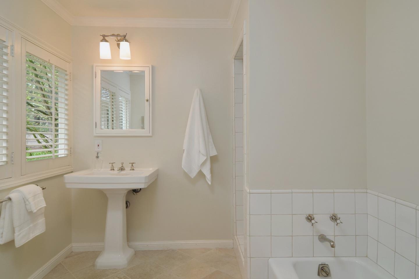 47 Ralston Road Atherton, CA 94027 - Photo 20 of 35 a bathroom with a sink a toilet and shower