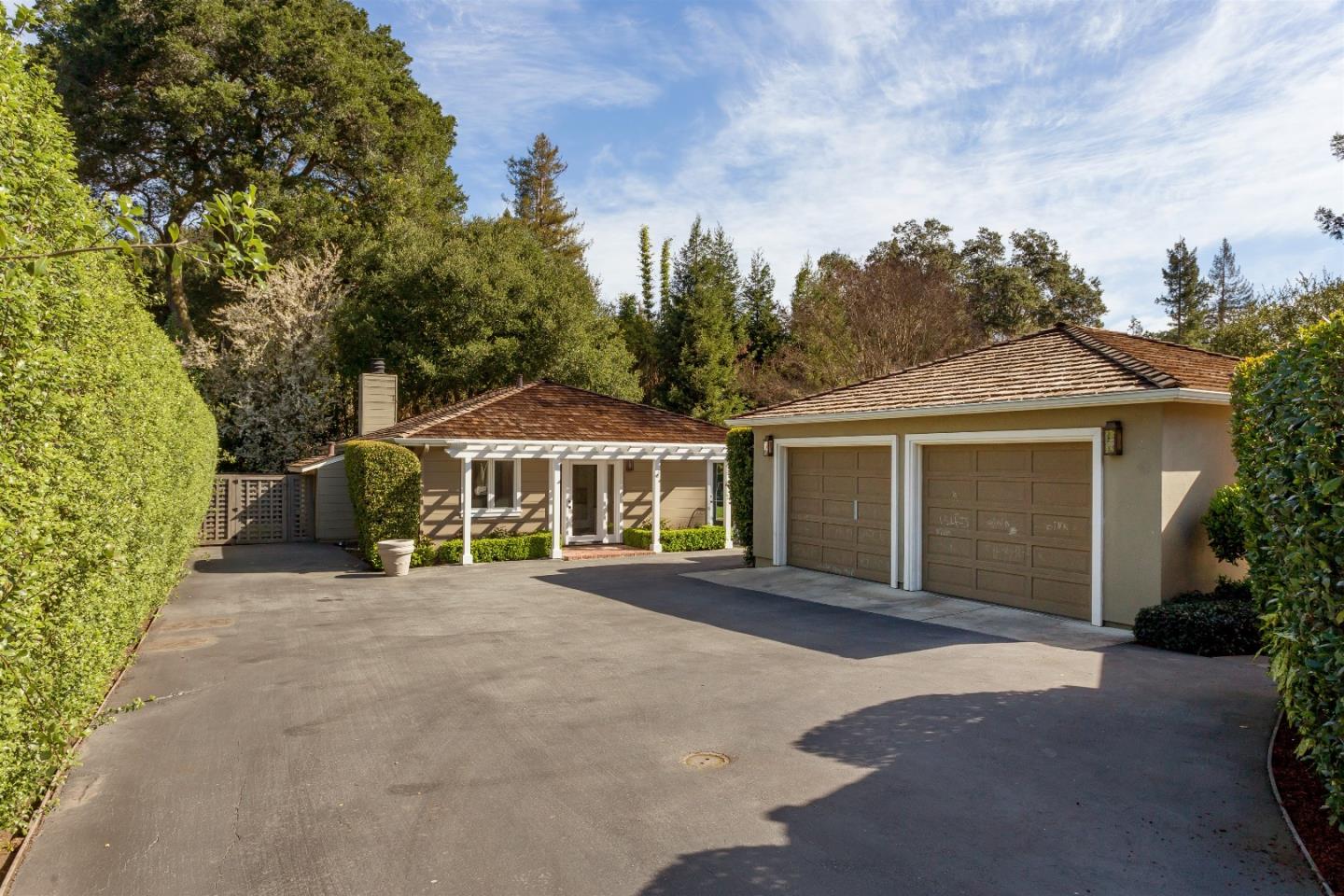 47 Ralston Road Atherton, CA 94027 - Photo 24 of 35 front view of a house with a garden