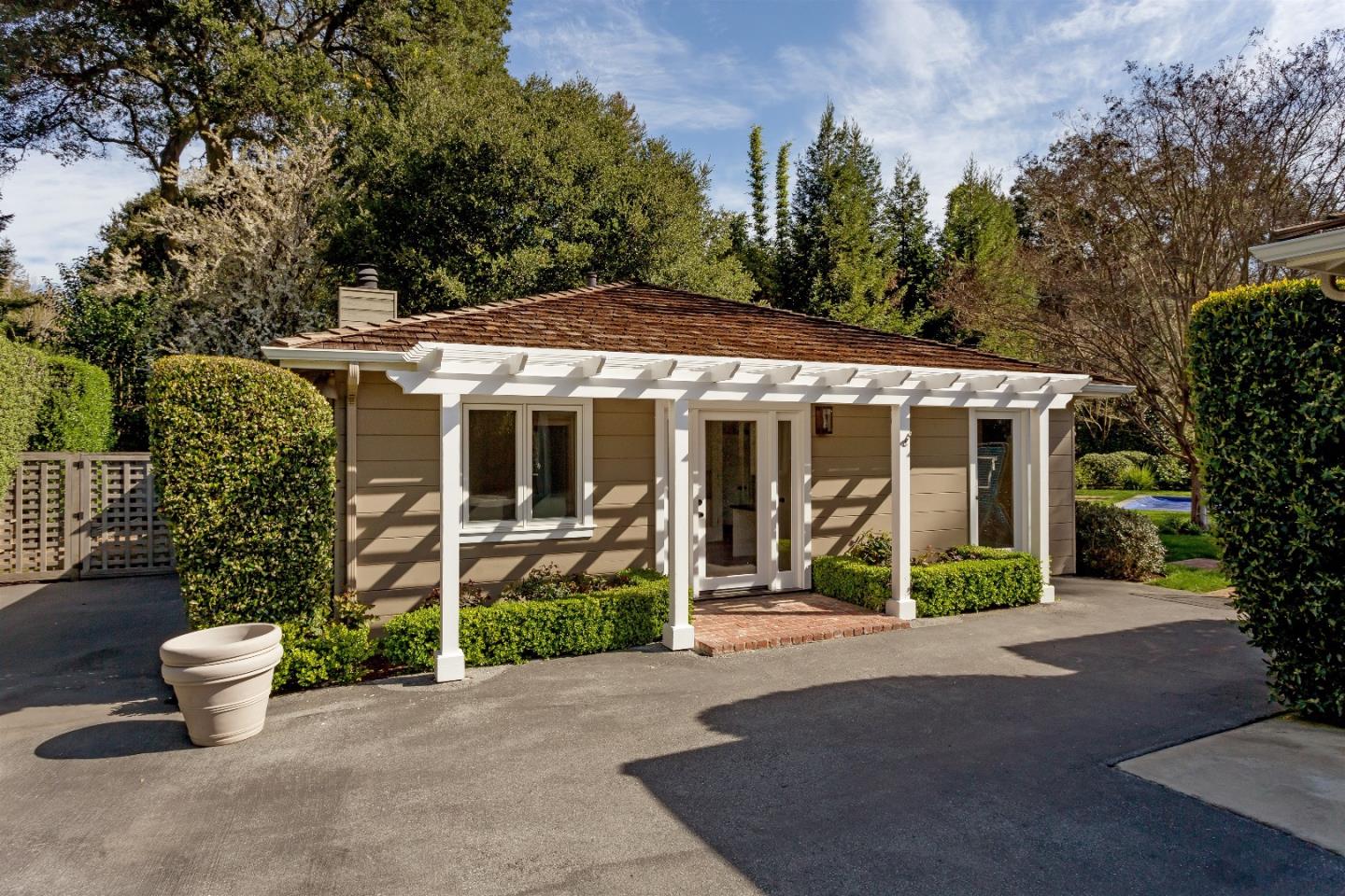 47 Ralston Road Atherton, CA 94027 - Photo 25 of 35 a front view of a house with garden