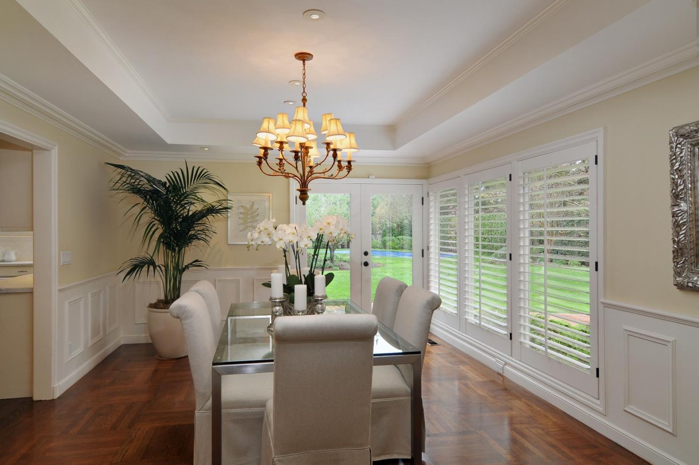 47 Ralston Road Atherton, CA 94027 - Photo 6 of 35 a view of a dining room with furniture wooden floor and chandelier