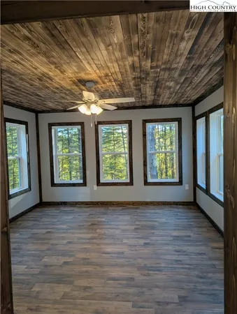 a view of a bench in the backyard