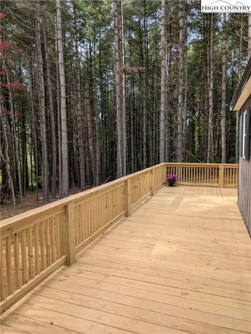 a backyard of a house with lots of trees