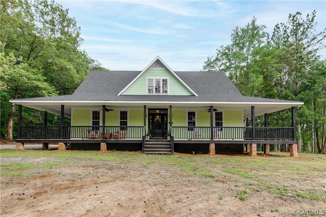 17137 Old Ridge Road Montpelier, VA 23192 - Photo 1 of 49 a front view of a house with garden
