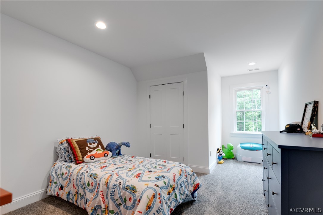 17137 Old Ridge Road Montpelier, VA 23192 - Photo 26 of 49 a bedroom with a bed and a window