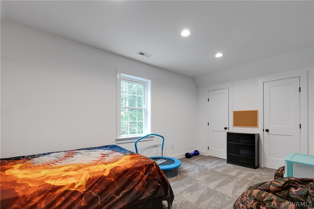 17137 Old Ridge Road Montpelier, VA 23192 - Photo 32 of 49 a bedroom with a bed and a window