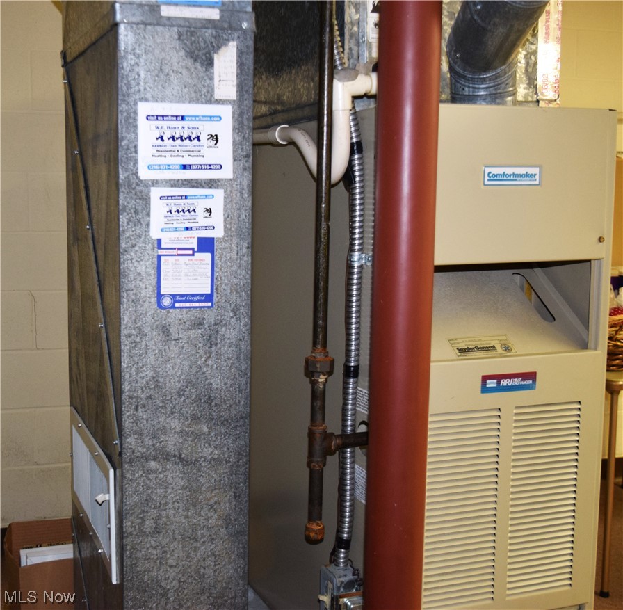22522 Center Ridge Road, Unit E Rocky River, OH 44116 - Photo 21 of 22 View of the furnace in one side of the basement.