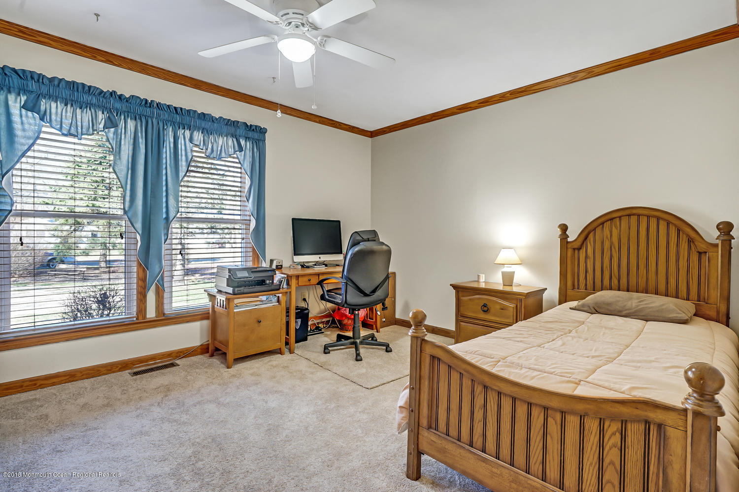 31 Frank Applegate Road Jackson, NJ 08527 - Photo 28 of 36 a bedroom with a bed and a chandelier