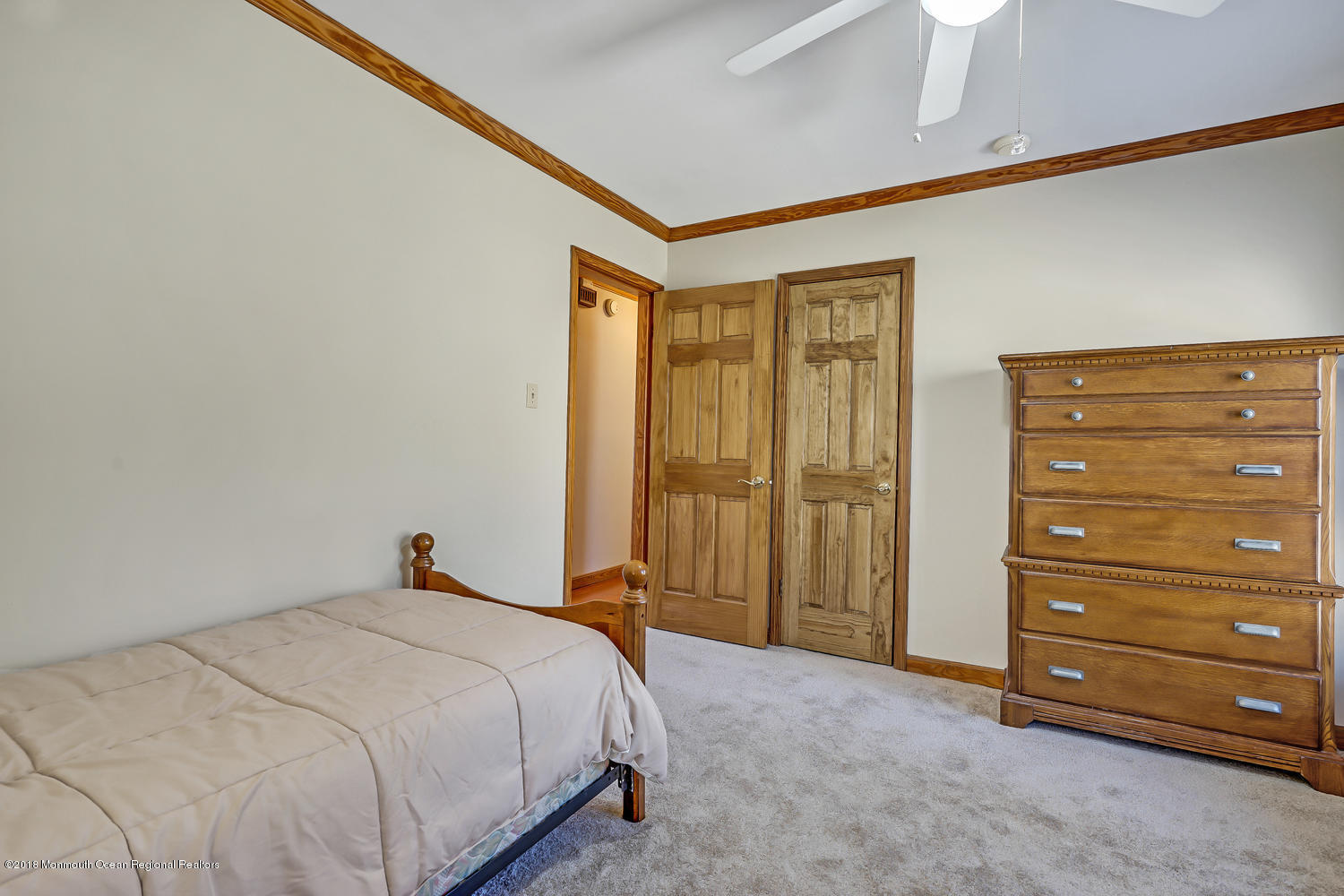 31 Frank Applegate Road Jackson, NJ 08527 - Photo 29 of 36 a bedroom with a bed and a dresser
