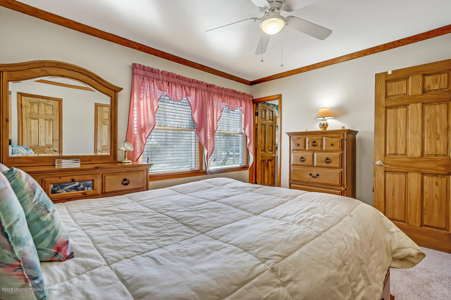 31 Frank Applegate Road Jackson, NJ 08527 - Photo 31 of 36 a bedroom with a bed dresser and a large window