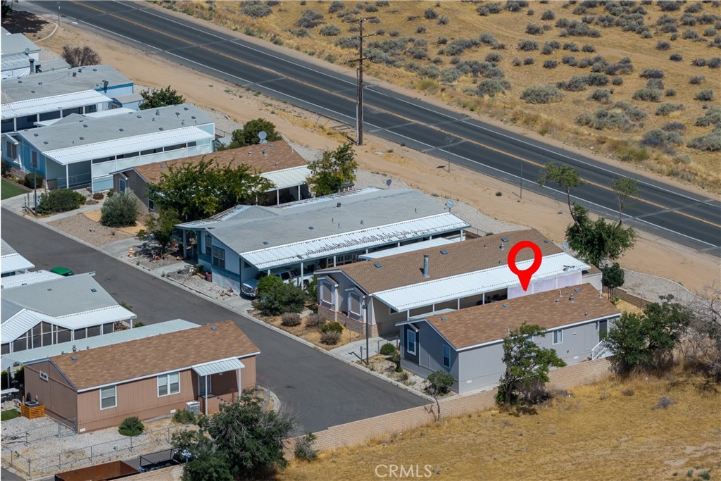 20843 Waalew Road, Unit C125 Apple Valley, CA 92307 - Photo 32 of 38 an aerial view of house with yard