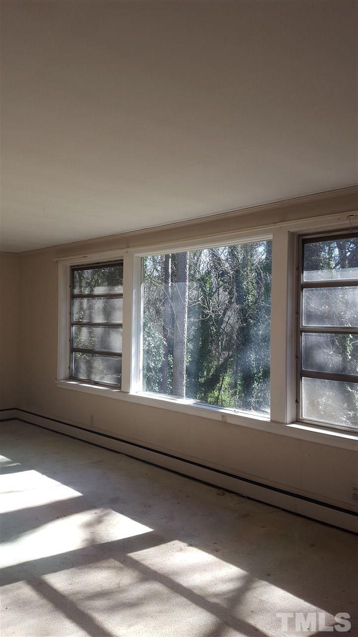 2617 Wells Avenue Raleigh, NC 27608 - Photo 5 of 7 a view of empty room with window