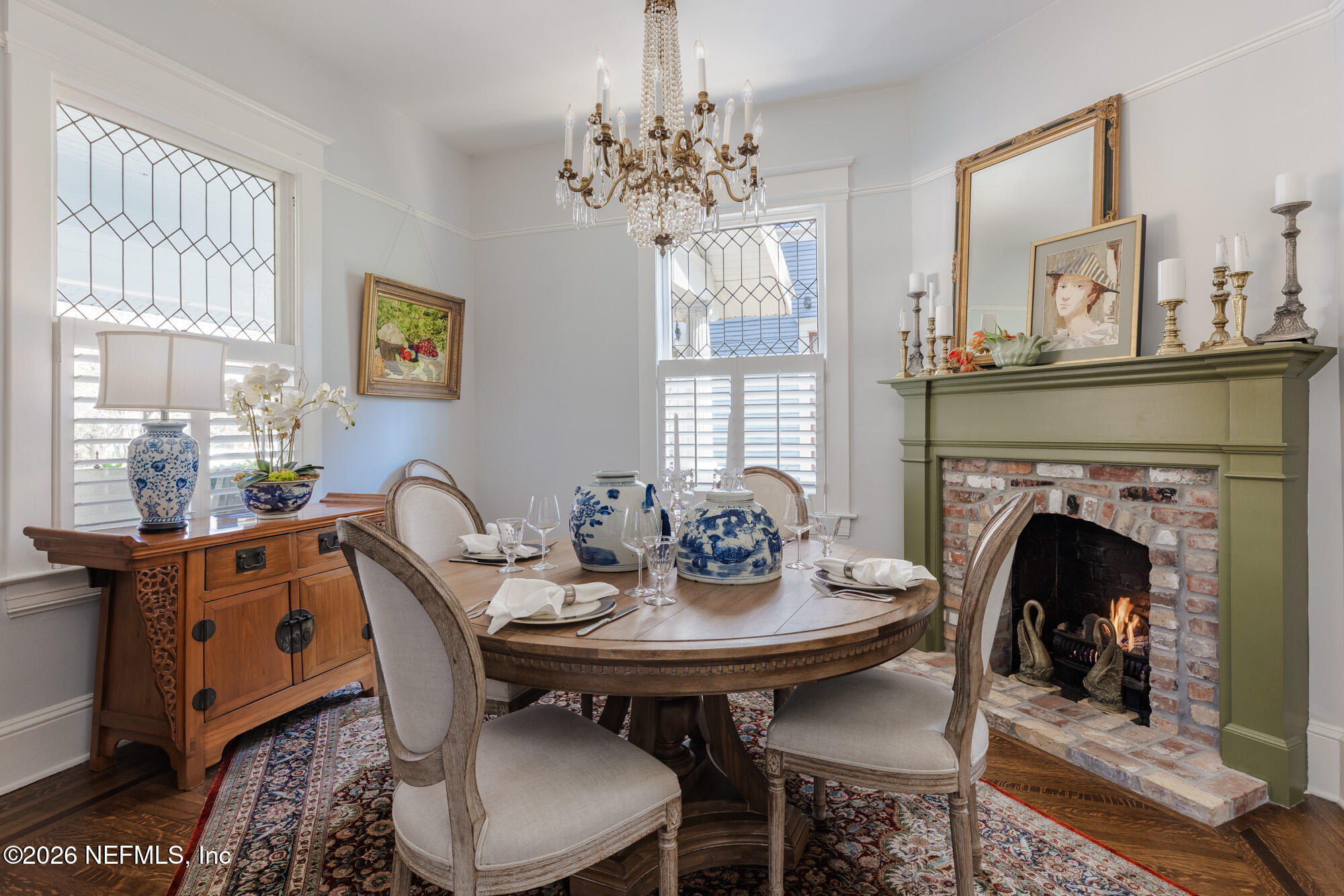 2326 Forbes Street Jacksonville, FL 32204 - Photo 12 of 55 a view of a dining room with furniture a chandelier and wooden floor
